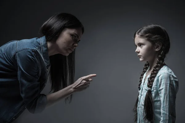 Very strict woman punishing her daughter — Stock Photo, Image