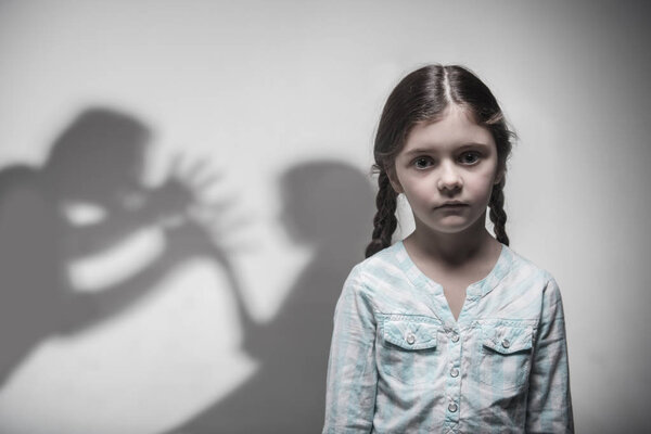 Portrait of young girl expressing despair