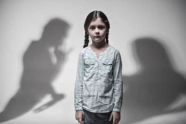 Little frustrated girl holding her arms at side — Stock Photo, Image