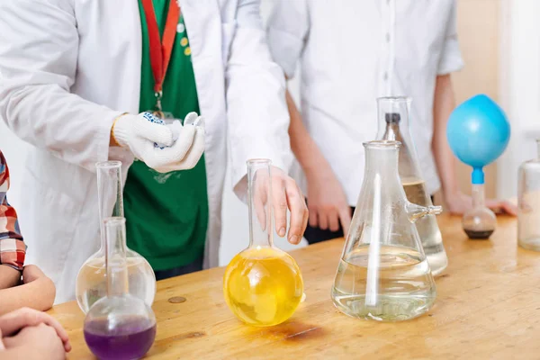 Scientist holding chemical reagent — Stock Photo, Image