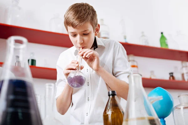 Boy using chemical equipment — Stock Photo, Image