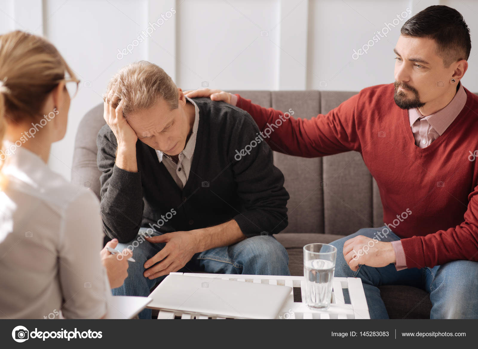 man-putting-hand-on-boyfriends-shoulder-stock-photo-by-yacobchuk1