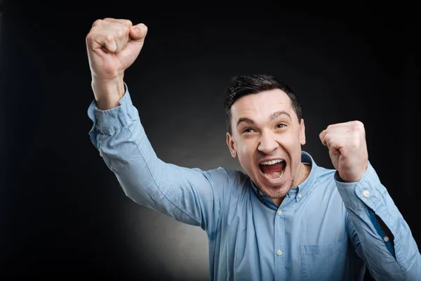 Happy man rising his hands up — Stock Photo, Image