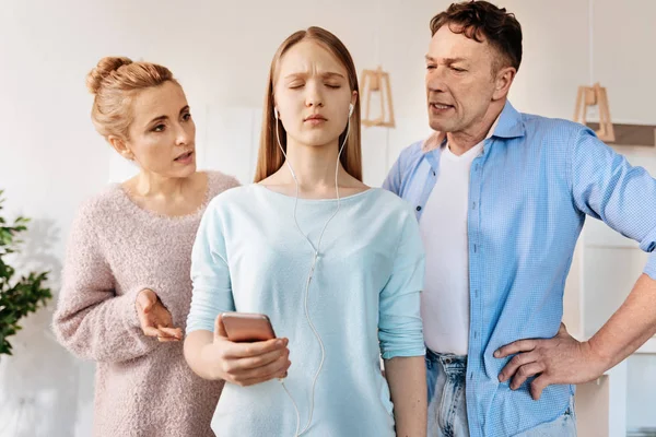 Caring parents scoldign their daughter — Stock Photo, Image