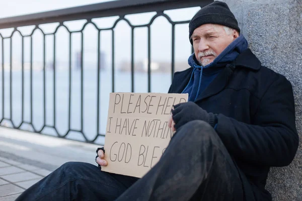 Portrait of serious male person asking for help — Stock Photo, Image