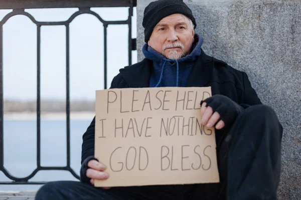 Poor man being very thoughtful — Stock Photo, Image