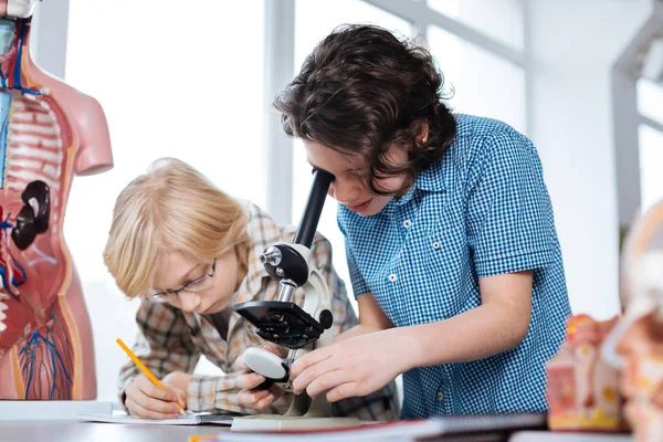 Persistent young boys studying biology — Stock Photo, Image