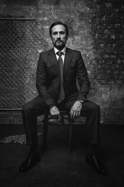 Big criminal boss having a conversation