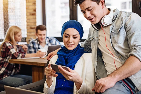 Positive delighted students resting in the cafe — Stock Photo, Image