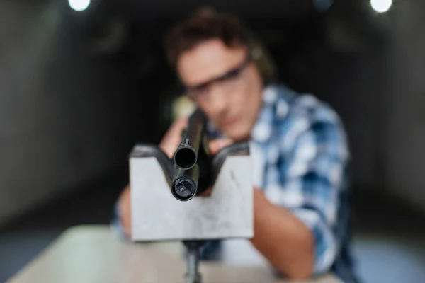 Confident professional marksman aiming at you — Stock Photo, Image