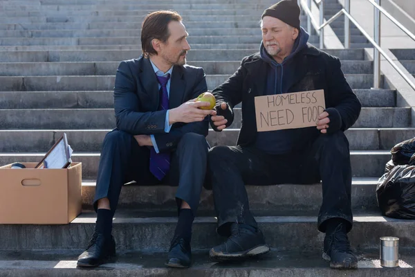 Jobless and homeless sitting next to each other — Stock Photo, Image