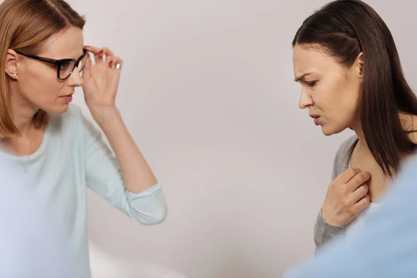 Portrait of worried female telling her story — Stock Photo, Image