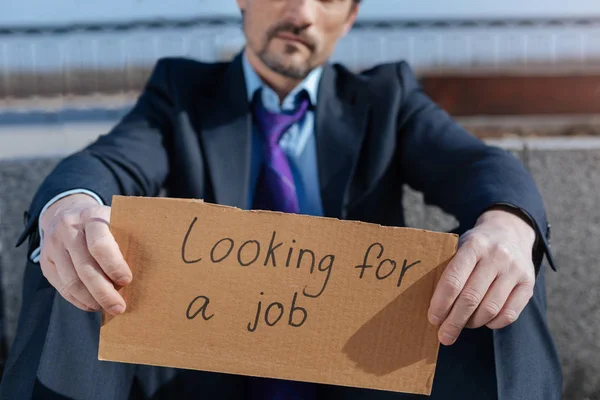 Close up of jobless man looking for new work — Stock Photo, Image