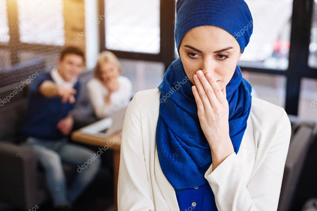 Depressed muslim woman feeling humiliated