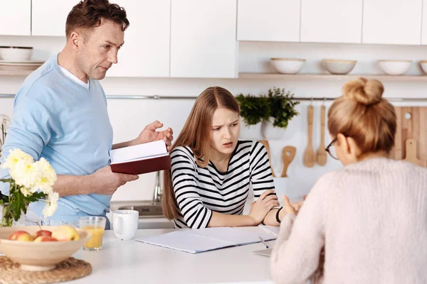 Pleasant family discussing problems — Stock Photo, Image