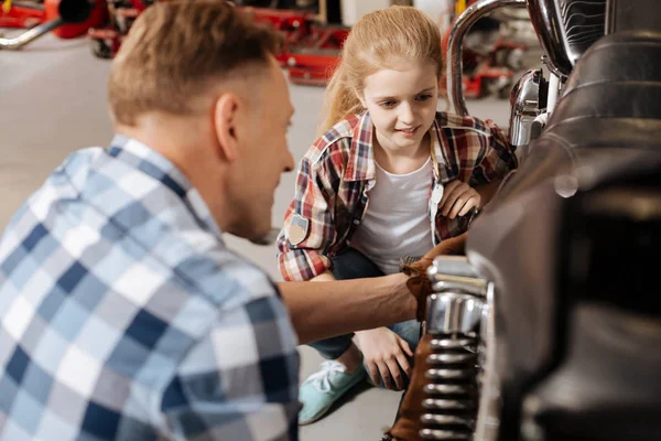 Brilliant eager child listening to dads lecture — Stock Photo, Image