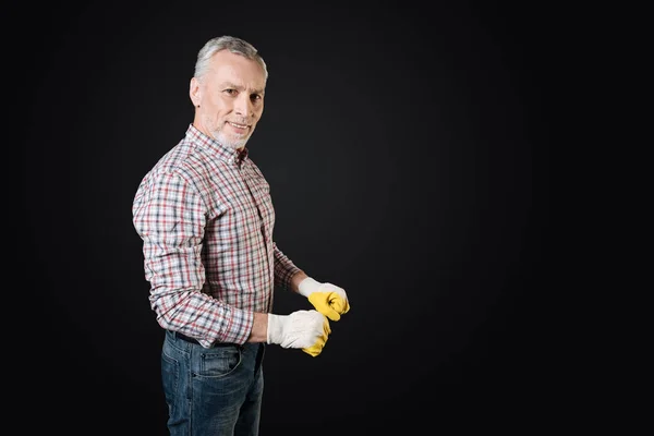Portrait of positive man keeping arms bent in elbow — Stock Photo, Image