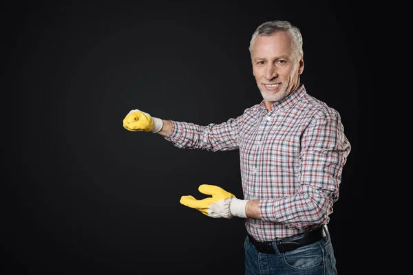 Old man holding his hands in air — Stock Photo, Image