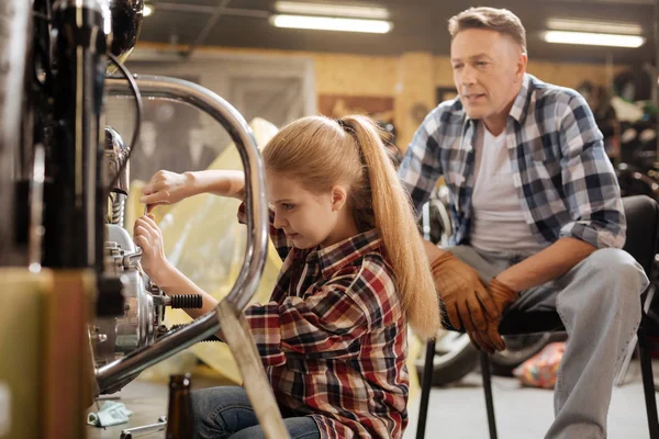 Admirable observant kid being a real mechanic — Stock Photo, Image