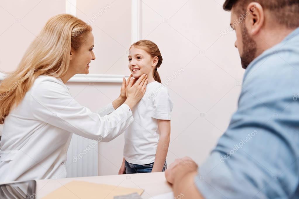 Attractive young patient keeping smile on her face