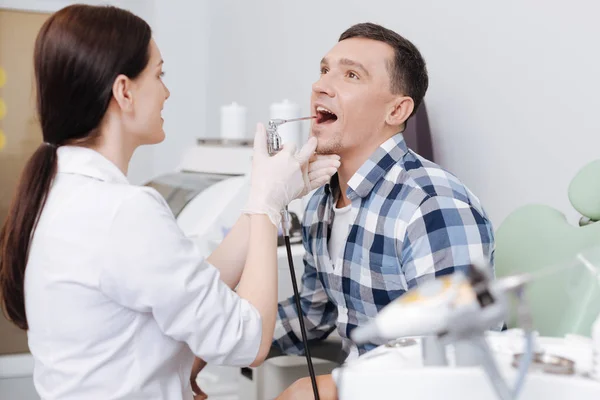 Positive man keeping his mouth opened — Stock Photo, Image