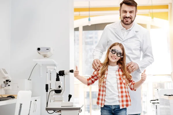 Glad enthusiastic girl seeing distinctly again — Stock Photo, Image