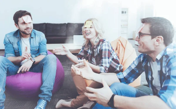 Positive colleagues restigng after work — Stock Photo, Image