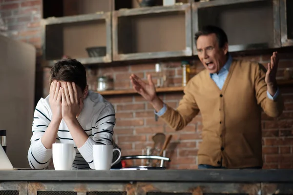 Aggressive father crying at his son — Stock Photo, Image