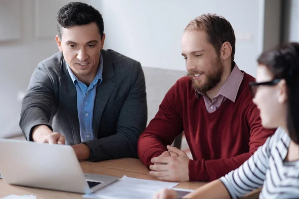 Three office workers discussing main tasks — Stock Photo, Image