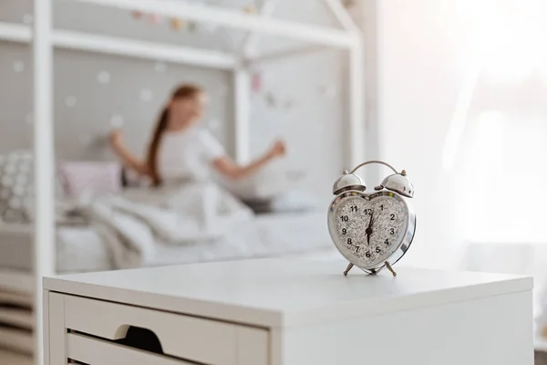 Active little girl waking up on the weekend — Stock Photo, Image