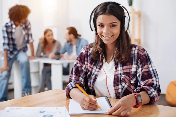Pretty smart lady preparing for upcoming testing — Stock Photo, Image
