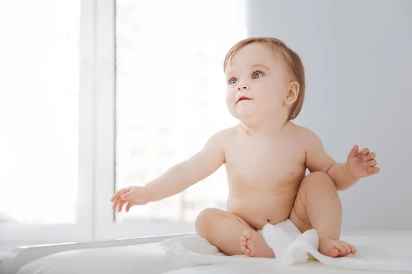 Wonderful excited child looking around in new place — Stock Photo, Image