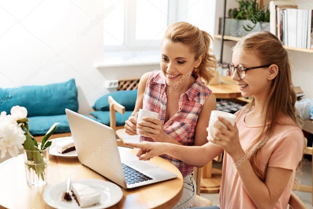 Upbeat daughter showing her favorite TV-show moment