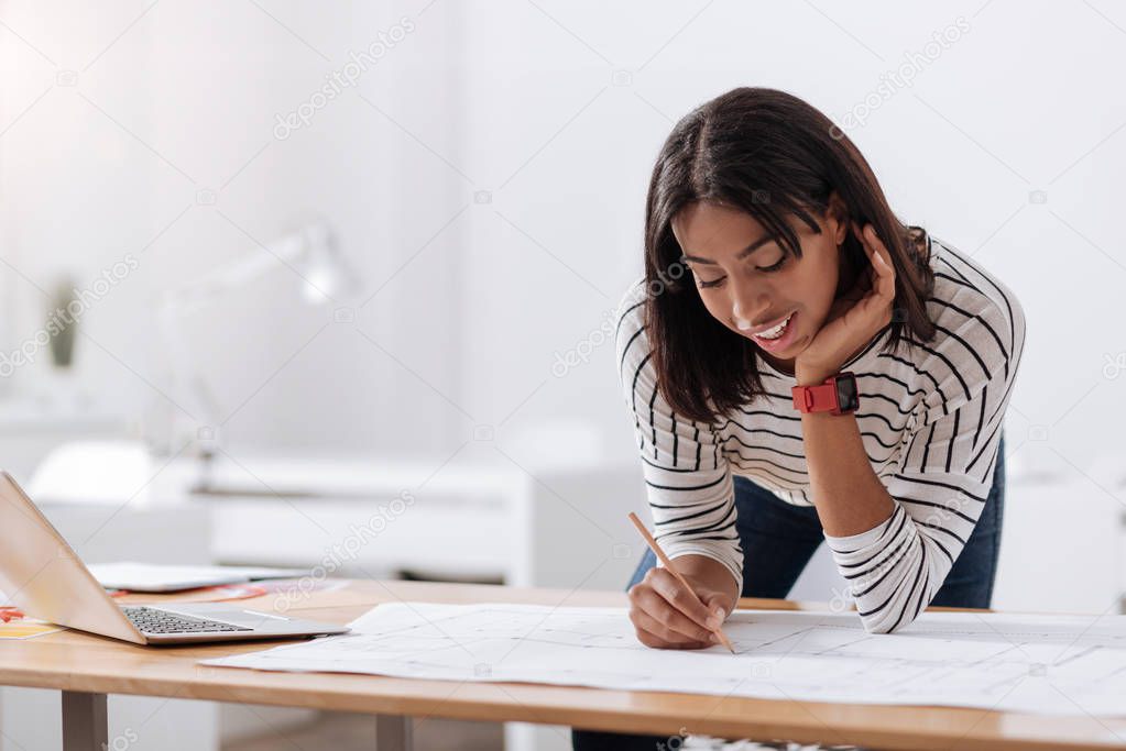 Hard working smart woman concentrating on her project