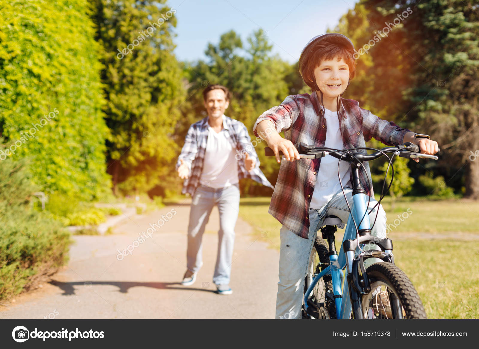 Genuine focused kid riding a bike for the first time — Stock Photo