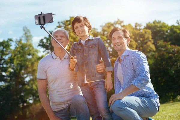 Energetic amazing men enjoying family weekend — Stock Photo, Image