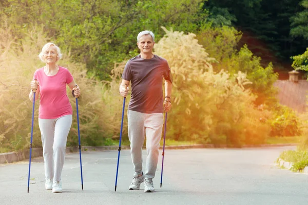 Happy nice couple walking in the countryside — Stock Photo, Image