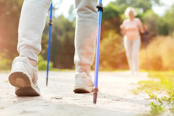 Close up of walking poles being in use — Stock Photo, Image