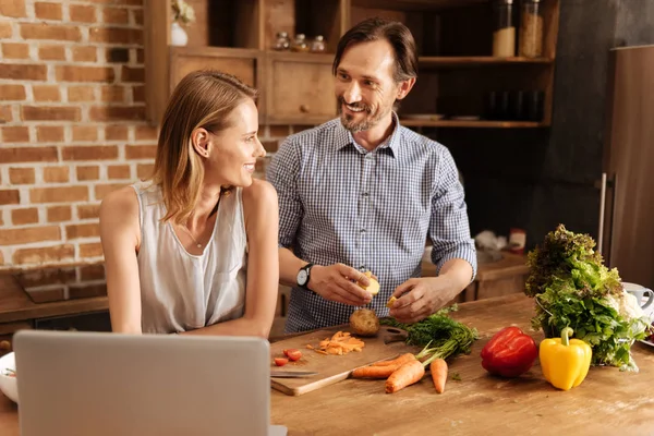 Cheerful charming family enjoying the process — Stock Photo, Image