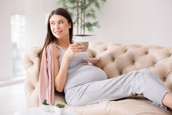 Thoughtful woman looking at window — Stock Photo, Image