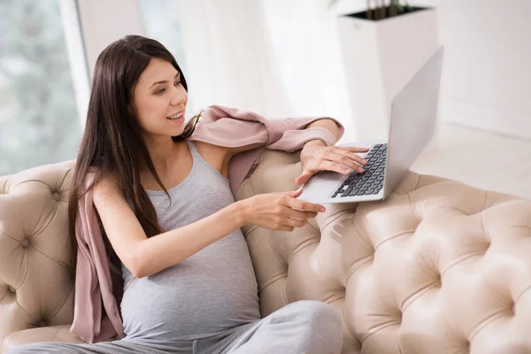 Charming woman having online conversation — Stock Photo, Image