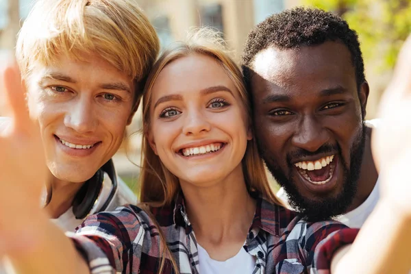 Pretty inspired girl having a great day in friends company — Stock Photo, Image