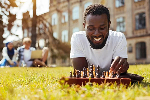 Admirable young man training his cognitive skills — Stock Photo, Image