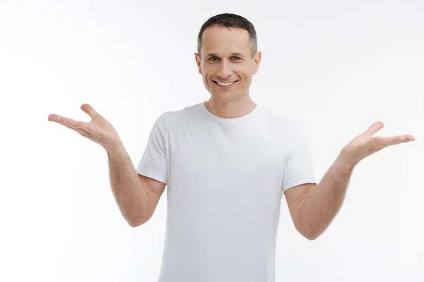 Positive male person keeping smile on his face — Stock Photo, Image