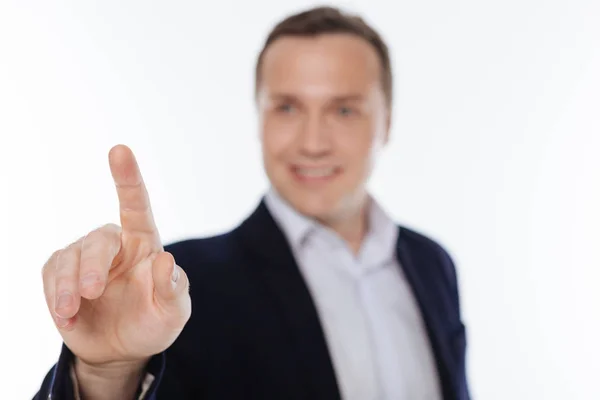 Precise intelligent man tapping on invisible screen — Stock Photo, Image