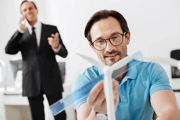 Engineer measuring wind turbine sail length with ruler — Stock Photo, Image