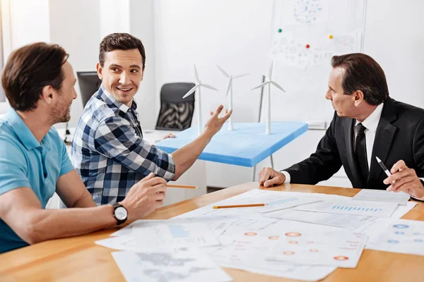 Young architect making his suggestions on work improvement — Stock Photo, Image