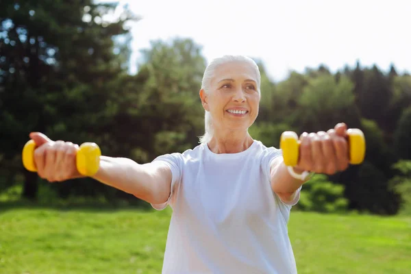 Positive delighted blonde loving sport — Stock Photo, Image