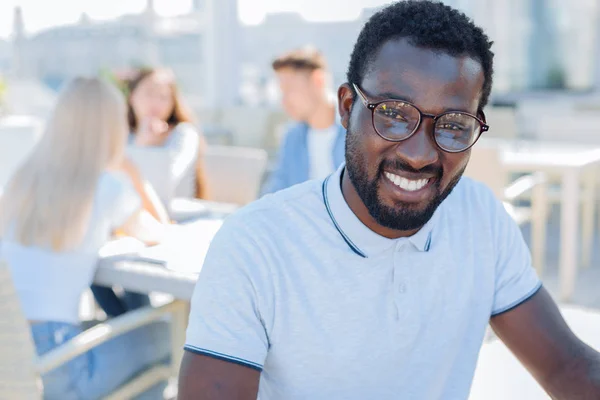 Portrait of african american guy beaming into camera — Stock Photo, Image