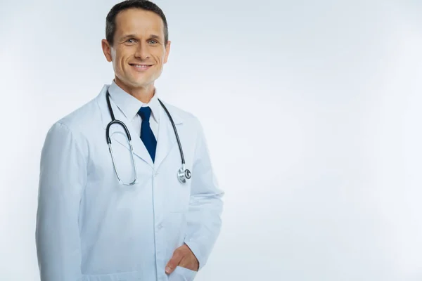 Friendly looking practitioner smiling into camera — Stock Photo, Image